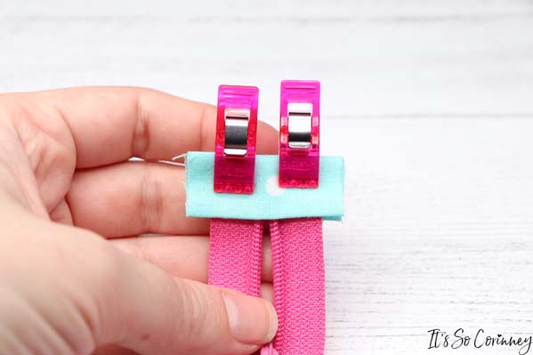 Clip Zipper End Tab To Cut End Of Zipper