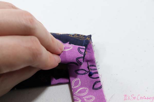 Fold The Excess Of Trim To The Back Of Mask