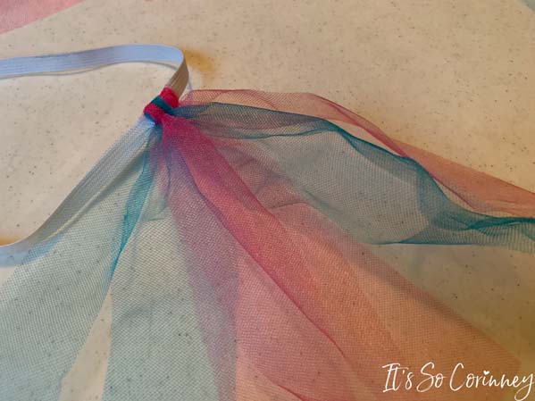Keep Adding Tulle Strips In Alternating Colors