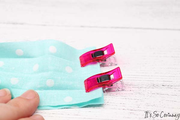 Open The Two Ends Of Wristlet Strap And Clip Together