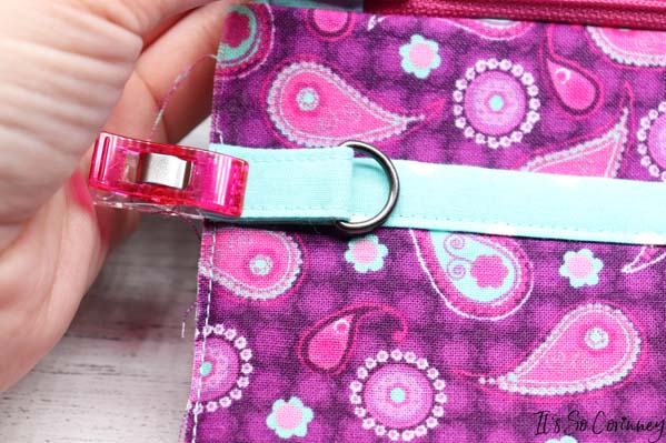 Pin D Tab To The Front Of The Double Pocket Wristlet Purse