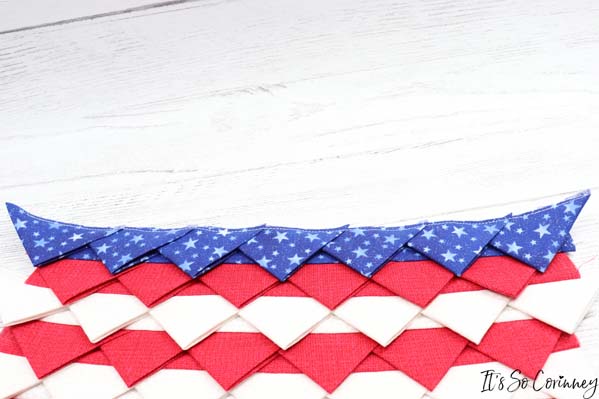 Place Sewn Triangles Onto American Flag Mini Quilt