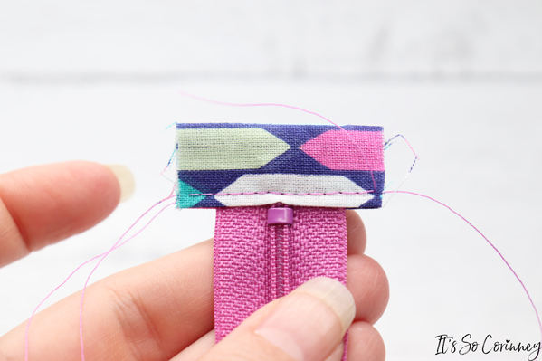 Sew Across The Zipper Tab