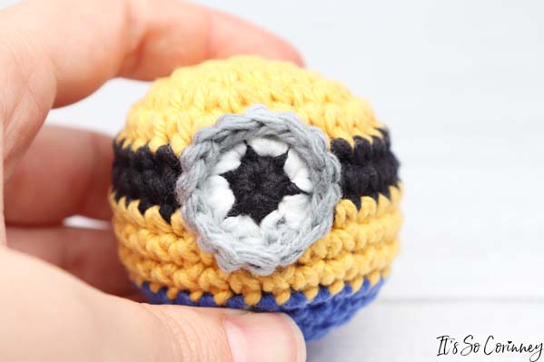 Sew The Eye To The Front Of The Crochet Minion Amigurumi