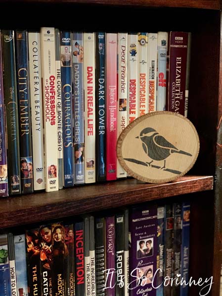 Stenciled Bird on Bookcase