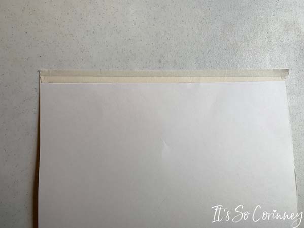 Tape White Poster Board Along Top