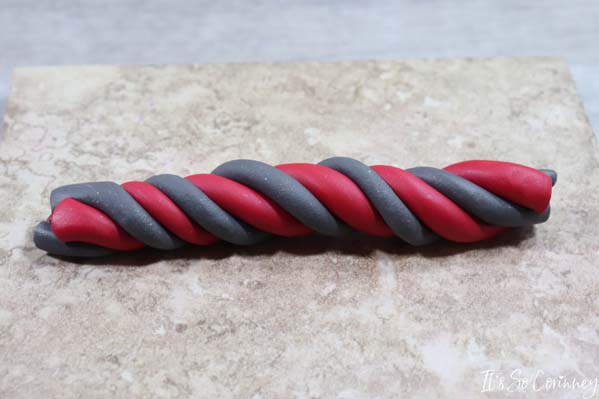 Twist Red And Gray Clay Together