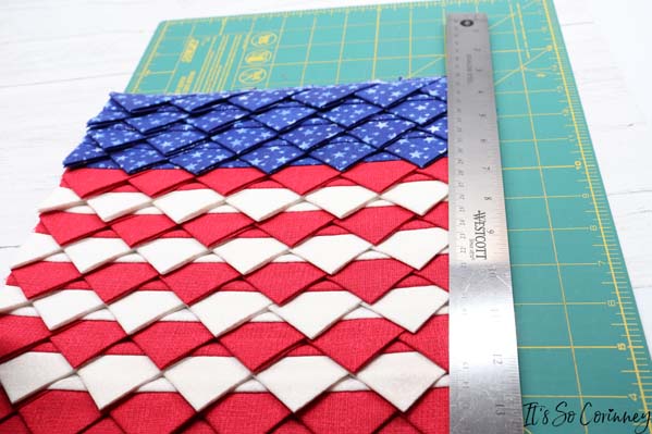 Use Straight Edge And Rotary To Square Up American Flag Mini Quilt